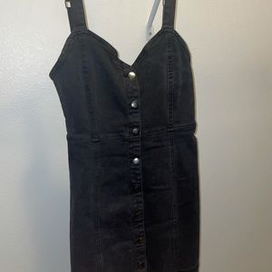 Forever 21 cute black button dress . Goes up to knee and above